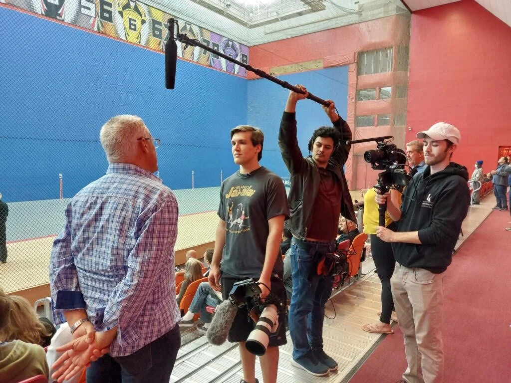 The Mucho crew together during production